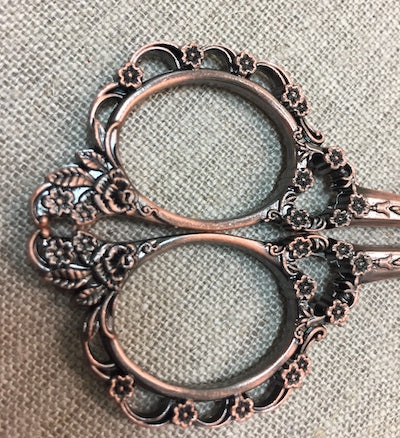 Ciseaux dentelle cuivre